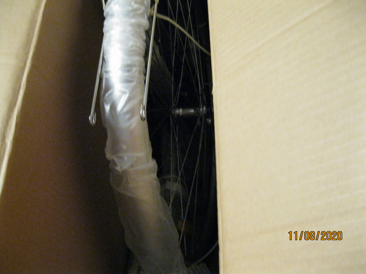 Открываю коробку с велосипедом