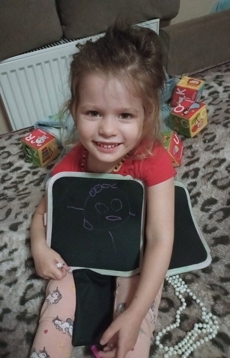 Горда своим творением. 