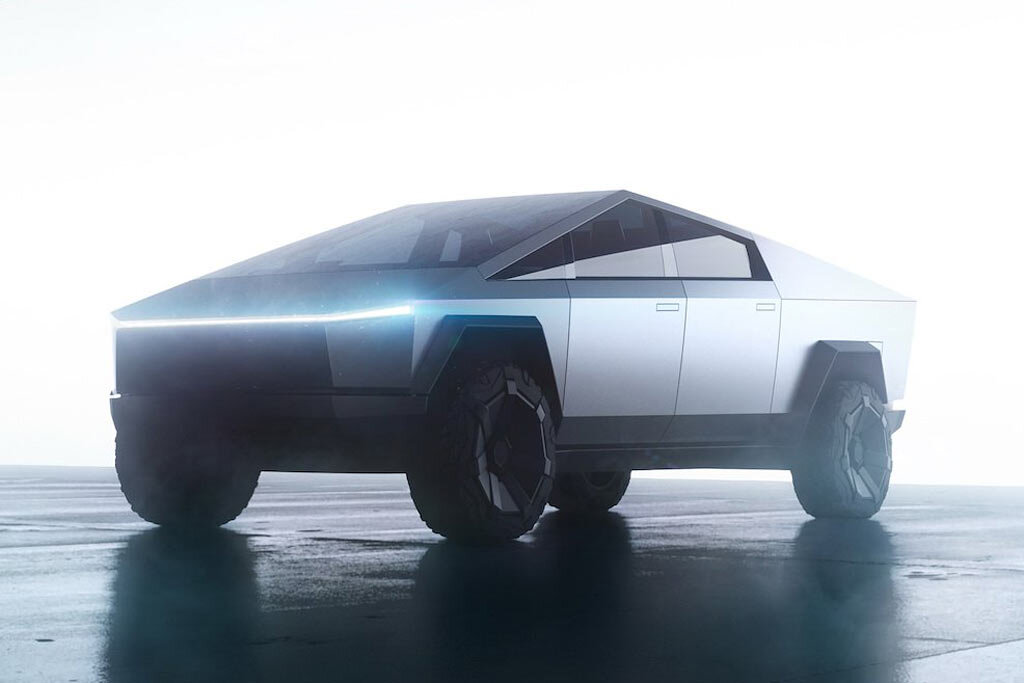 Для начала узнаем,что из себя представляет это авто. Как известно, Tesla выпускает только электромобили,которые выделяются своим внешним видом.
Теперь давайте перейдем к автомобилю ''Tesla Cybertruck''
Сначала осмотрим его внешность,начнем с колес.
Колеса у Tesla Cybertruck редкие,имеют свою необычную форму.
Так же у Теслы Кибертрака очень необычные стёкла,особенно лобовое,которое имеет панорамный вид.

Теперь осмотрим Внешность. В глаза сразу бросаются фары,а точнее одна фара,которая имеет очень необычный вид.

И сразу хочется сказать об основных деталях Теслы Кибертрака,например,его двери,которые открываются вверх,как у многих автомобилях Tesla. Так же у Теслы Кибертрака серый монотонный цвет,и лично я считаю,что это его минус. Так же багажник и капот у Теслы Кибертрака тоже необычной формы.