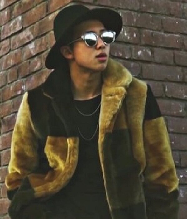 BTS. RM in a fur coat