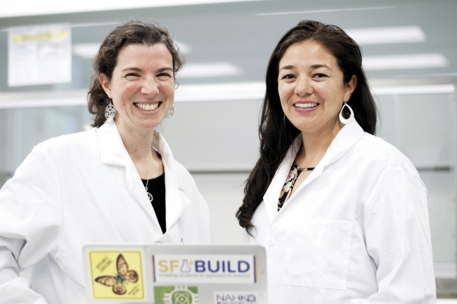 Alegra Eroy-Reveles (right), an assistant professor of chemistry and biochemistry at San Francisco State U., uses Gradescope. “Getting feedback from a test you took two weeks ago is not going to help,” says Eroy-Reveles, shown here with Anna Martinez-Saltzberg, an instructor. “It’s important to get it in a timely manner.” 