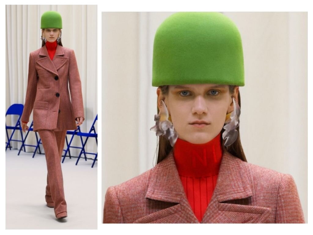 Крышки от флаконов с целующимися голубками в качестве ушных украшений.