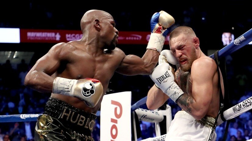    Боксёр Флойд Мейвезер — младший и боец MMA Конор Макгрегор Gettyimages.ru Christian Petersen / Staff