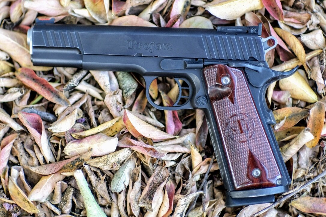 Trojan 45ACP  1911, выпускаемый компанией. STI