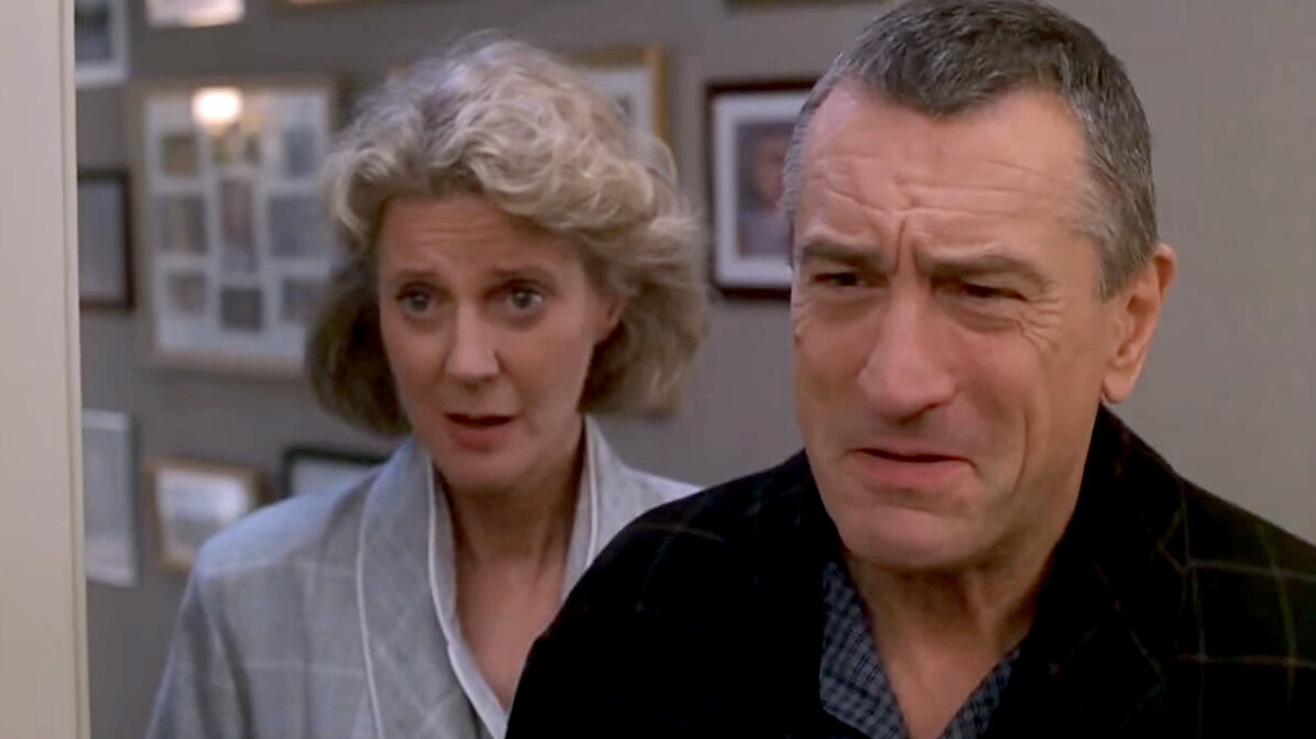 Блайт Даннер (Дина Бернс), Роберт де Ниро (Джек Бернс). Кадр из кинофильма "Знакомство с родителями", 2000 г., режиссер Джей Роуч, сценаристы Грег Глиенна, Мэри Рут Кларк, Джим Херцфелд, композитор Рэнди Ньюман. Скриншот кадра для иллюстрации