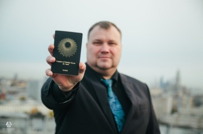 Дмитрий Жихарев с паспортом своей личной страны.