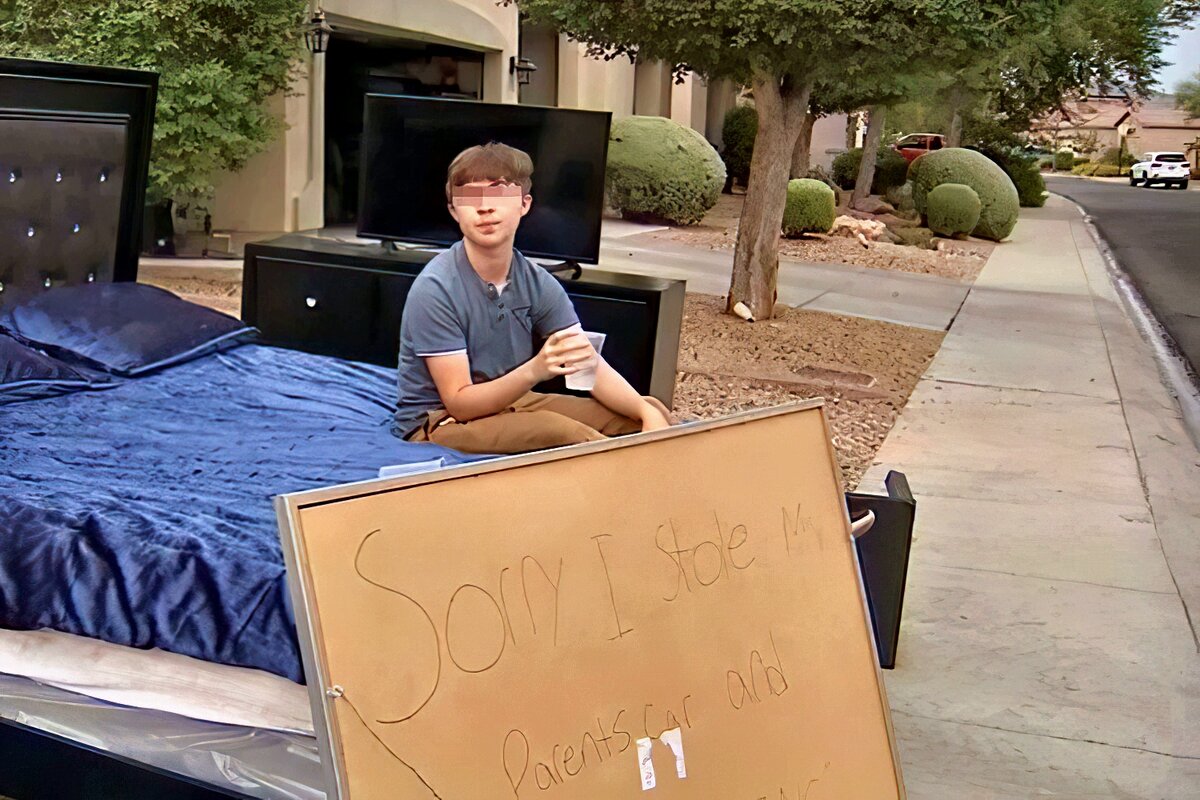 Надпись на доске "Извините, я украл машину родителей и превышал скорость"