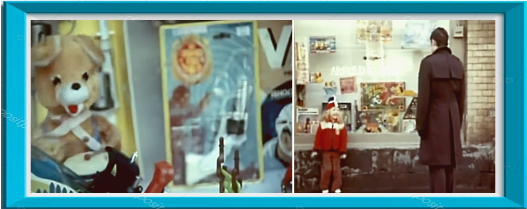 Джордж Кэттл у витрины магазина с игрушками