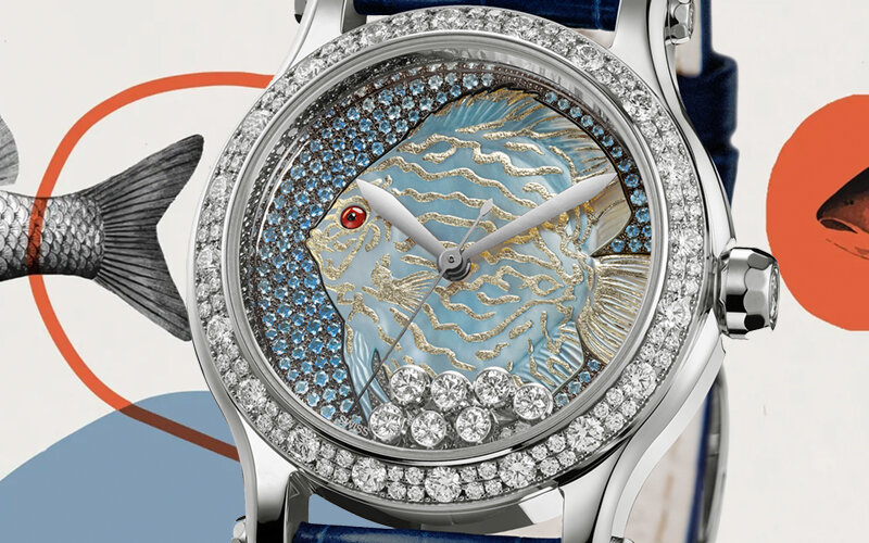 Часы Chopard Happy Fish в 36 мм корпусе из белого золота с бриллиантами по безелю и плавающими бриллиантами