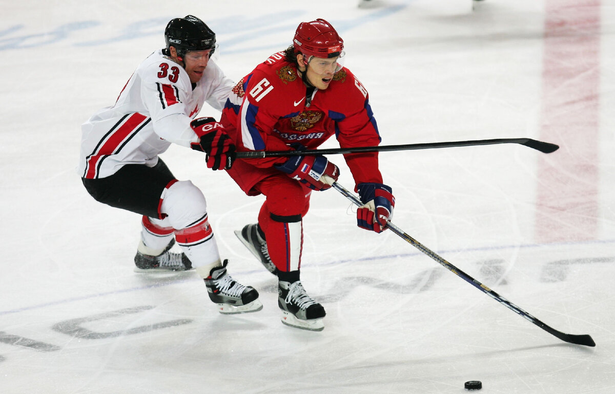 Олимпиада-2006. 1/4 финала. Россия — Канада — 2:0. Крис Дрэйпер и Максим Афиногенов. Фото Getty Images