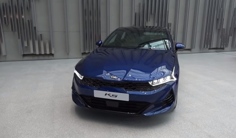 Kia k5 зеленая