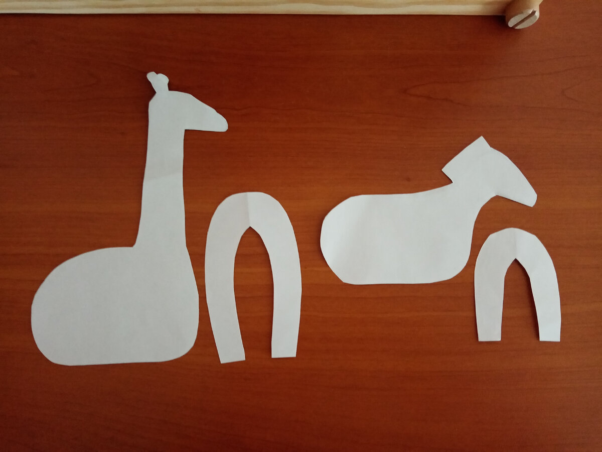 Жираф и зебра (чтобы увидеть слона и жирафа, листайте вправо по стрелке)