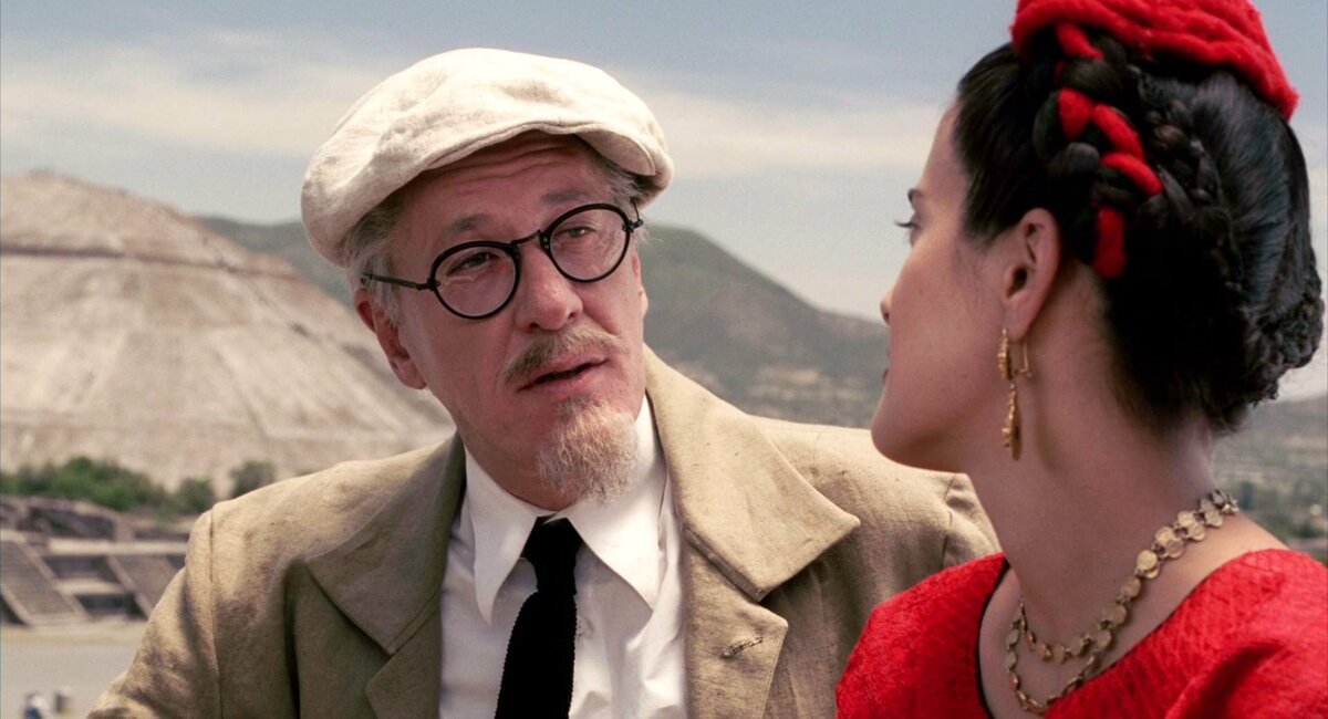 Джеффри Раш в роли Троцкого, Сальма Хайек в роли Фриды Кало. Кадр из фильма "Фрида". 