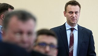На Навального подали в суд, требуя компенсации за "испорченный День России"