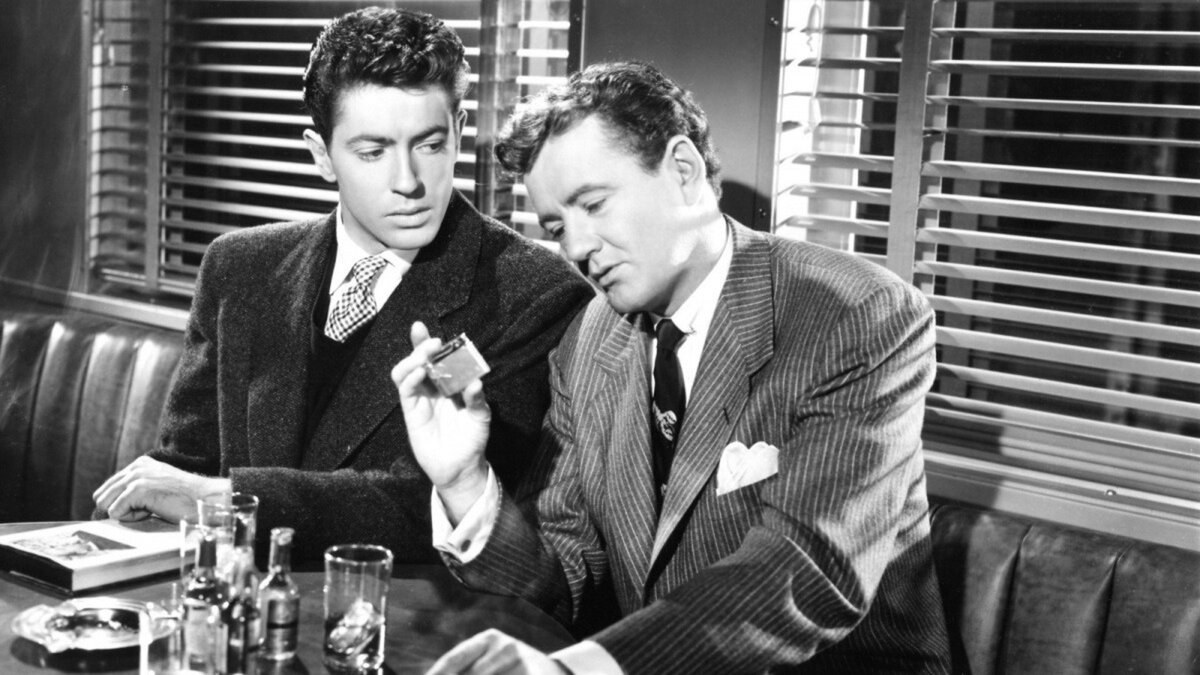 Кадр из фильма "Незнакомцы в поезде", 1950 г.