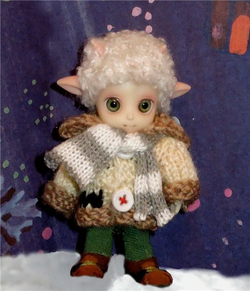 Тут Лешик в зимнем прикиде, о его прогулках по снегу я еще напишу отдельно.