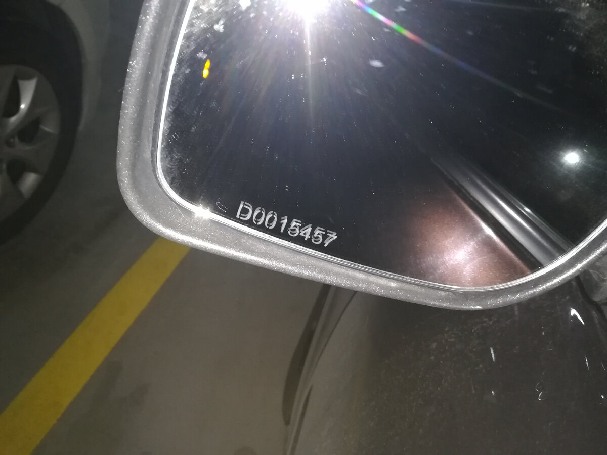 Противоугонная маркировка стекол автомобиля.