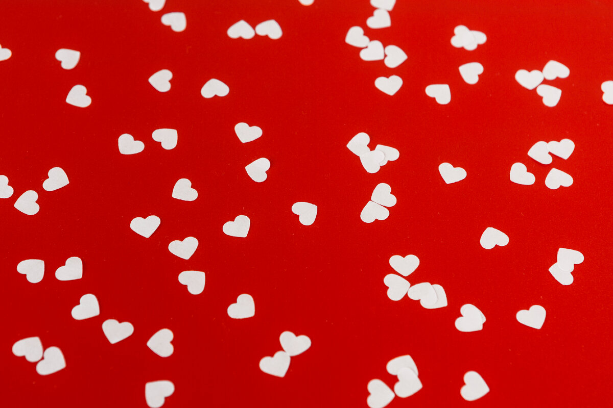 Image by <a href="https://www.freepik.com/free-photo/small-paper-hearts-table  Freepik</a>
