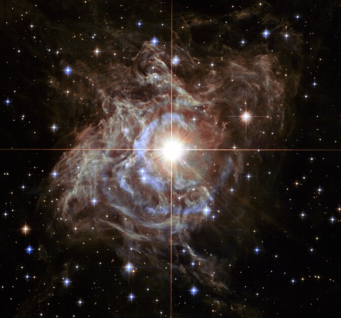 Образ яркой звезды RS Puppis . Фото NASA/ESA/Hubble Heritage (STScI/AURA)-Hubble/Еuropa Collab