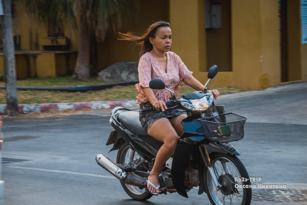 Woman Kickstart on Moped