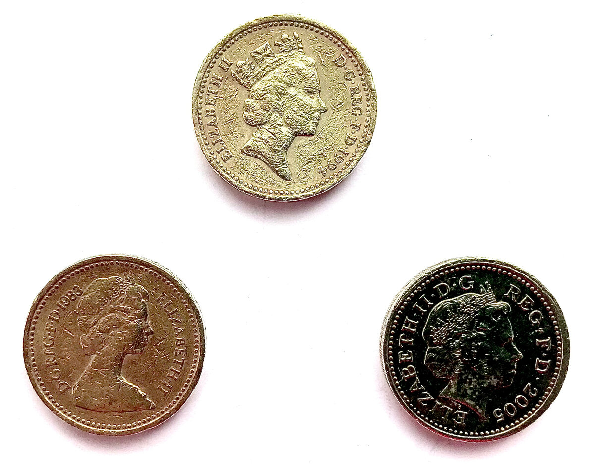 монеты 1 фунт стерлингов англии. на монете one pound 1997. английские монеты. символика на британских монетах. британский фунт монеты.