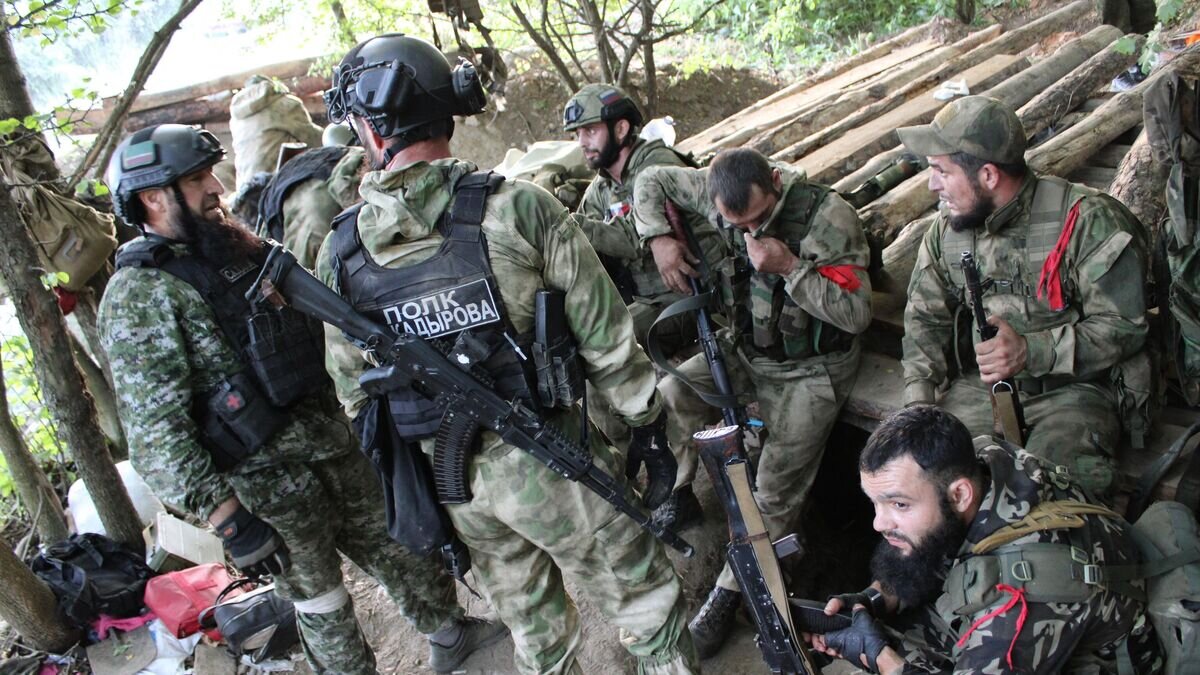    Бойцы чеченского отряда "Ахмат" в ЛНР© РИА Новости / Геннадий Дубовой