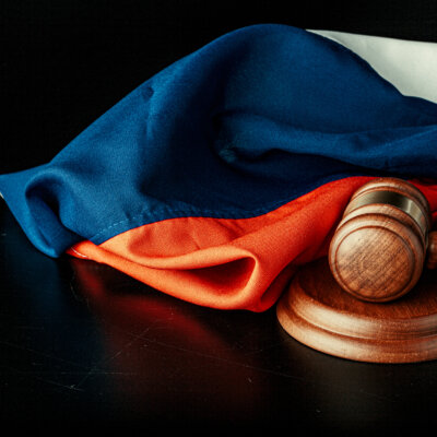    Russian justice. Wooden gavel and russian flag Валерий