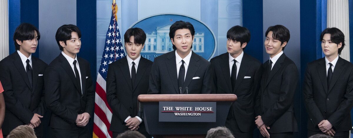 BTS at the White House in May 2022 (L to R): V, Jungkook, Jimin, RM, Jin, J-Hope, and Suga