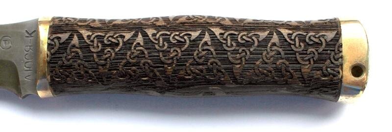 Рукоять ножа.