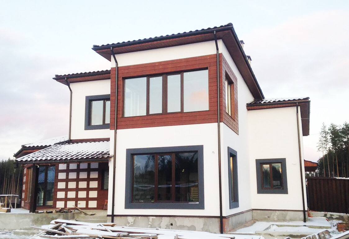 Отделка фасадов каменного дома.