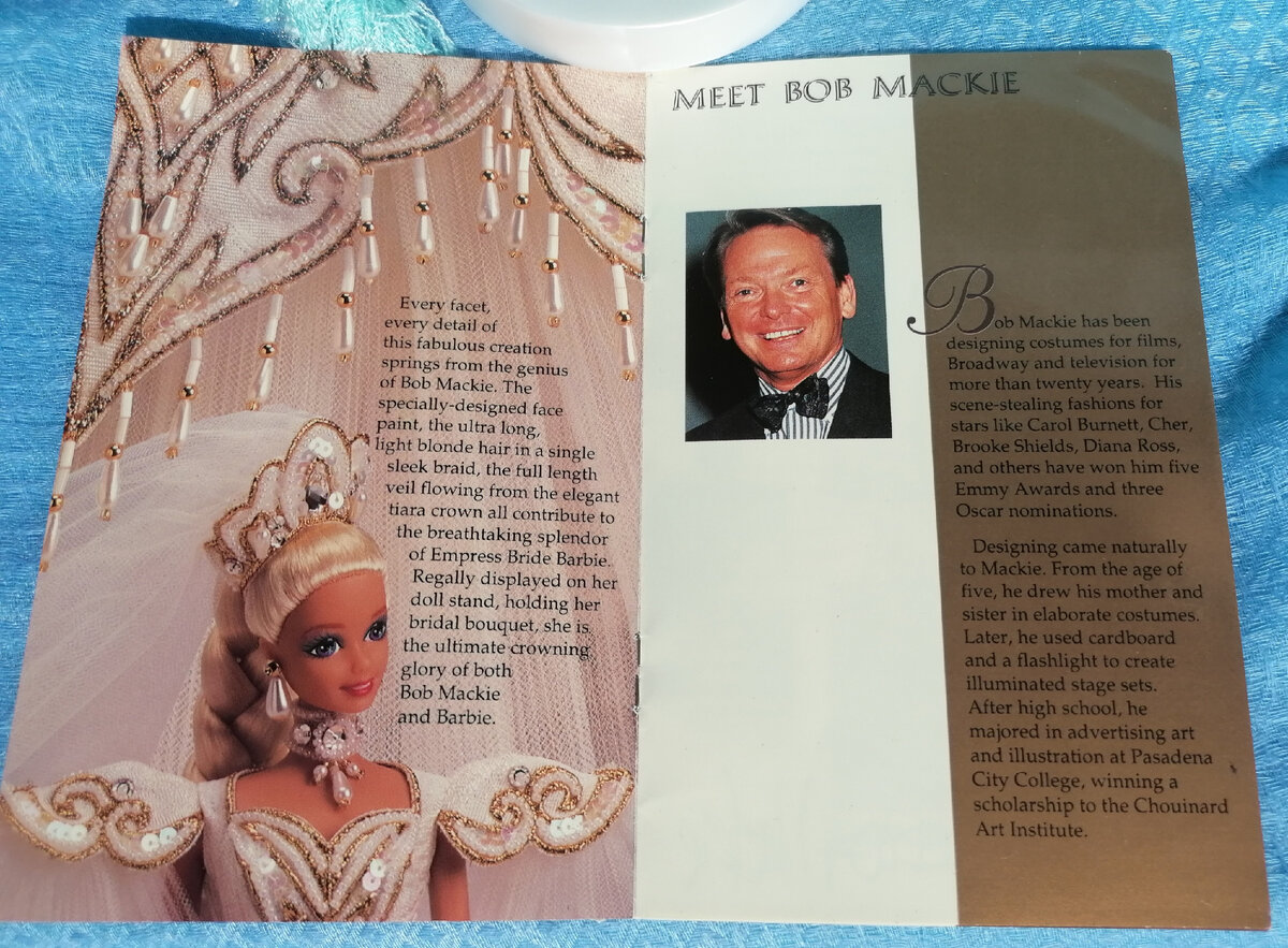 Боб Маки — источник каждой детали, каждой грани этого восхитительного творения. Специально разработанный макияж, ультрадлинные легкие волосы цвета блонд, уложенные в гладкую косу, длинная фата, ниспадающая с элегантной тиары создает захватывающее дыхание великолепие Имератрицы-Невесты. Расположенная на кукольном постаменте, держащая свадебный букет она безусловно по-королевски великолепна и является венцом славы Боба Маки и Барби.
Боб маки разрабатывал костюмы для фильмов, постановок на Бродвее и телевизионных фильмов более, чем 20 лет. Он создавал сценические наряды для таких звезд, как Кэрол Барнет, Шер, Брук Шилдз, Дианы Росс и других, что позволило ему получить 5 наград Эмми и трижды номинироваться на Оскар.
Дизайн платьев приходил к Маки естественно. С возраста пяти лет он рисовал портреты матери и сестры в детально проработанных костюмах. Позже он использовал картонную коробку и фонарик что бы создать подсвеченный сценический комплекс. После школы он специализировался в искусстве рекламы и иллюстрации в городском колледже Пассадены, выиграв стипендию института искусств Чойнардс.