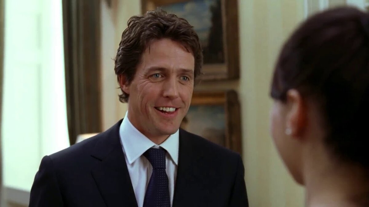 Кадр из фильма "Любовь с уведомлением". В главных ролях Сандра Буллок и Хью Грант