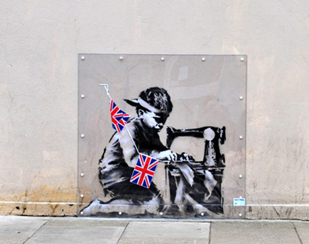 Граффити «Рабский труд», нарисованное Бэнкси в мае 2012 года в ответ на празднование 60-летия правления королевы Елизаветы II