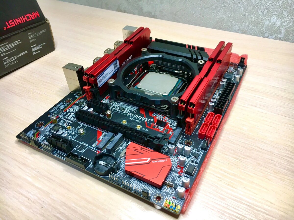 Китайская материнская плата MASHINIST X99 RS9