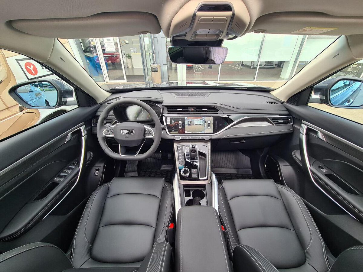 Интерьер Geely Atlas Pro Flagship 177 л.с. 2022
