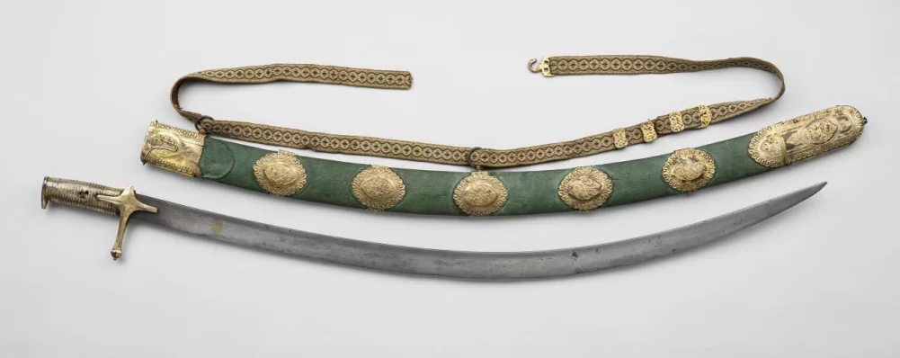 Сабля и ножны с поясом. XVI в; рукоять и ножны - XVII в.  Принадлежала князю Дмитрию Михайловичу Пожарскому. Из собрания Оружейной палаты Московского кремля