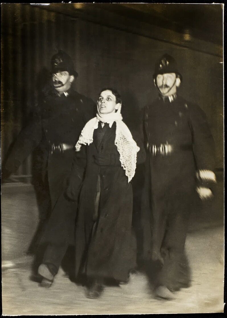 https://commons.m.wikimedia.org/wiki/File:Arrest_of_a_suffragette_on_Black_Friday1910-11-18_(22163159204).jpg