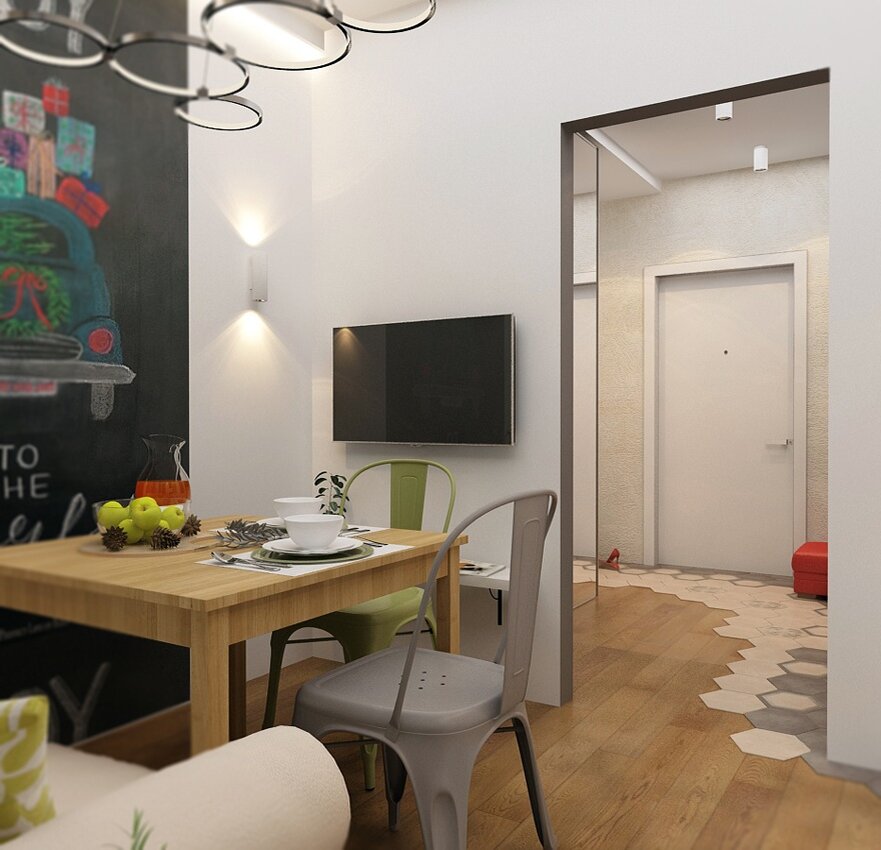 Просто, но со вкусом. Прямоугольная сканди-студия с интересными решениями