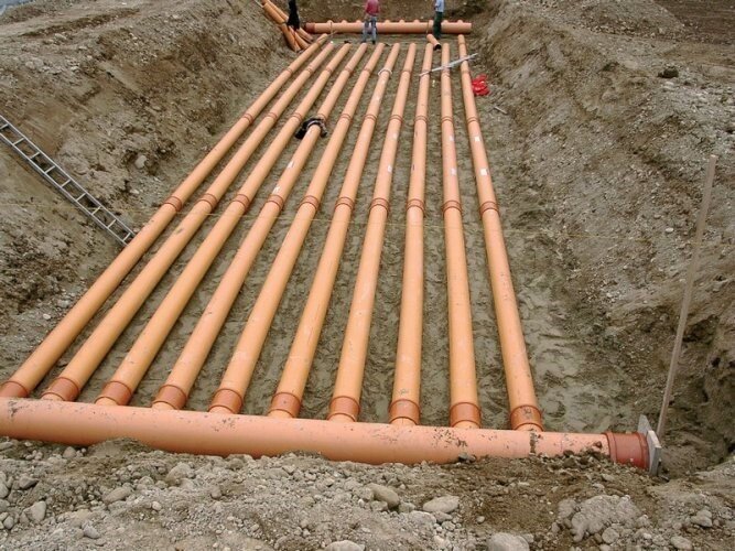 Пример укладки ГТА в грунт под фундамент дома.