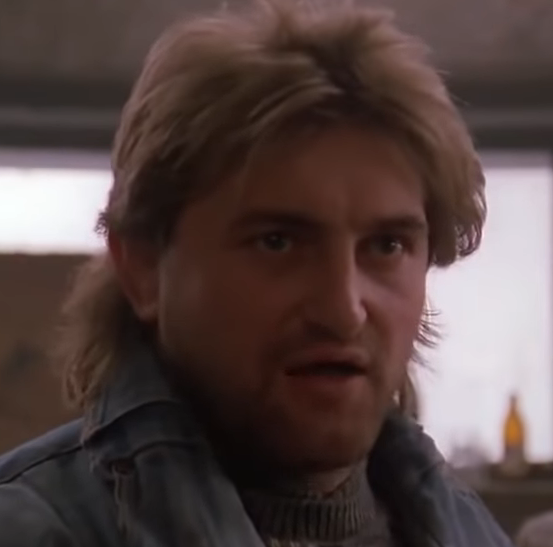 Кадр из фильма Красная Жара с Железным Арни