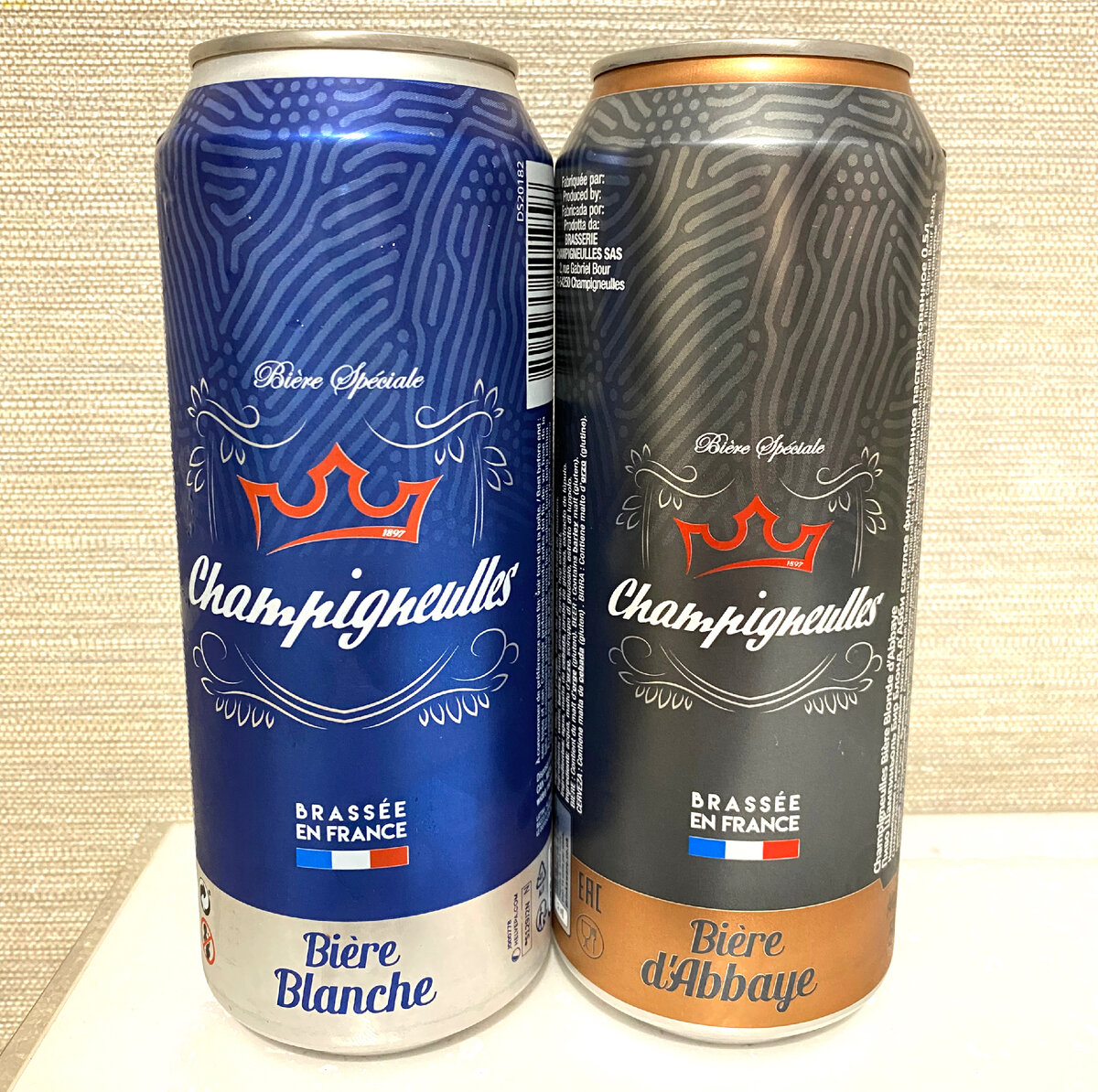 «Champigneulles Blanche» и «Champigneulles d'Abbaye» в банках. 