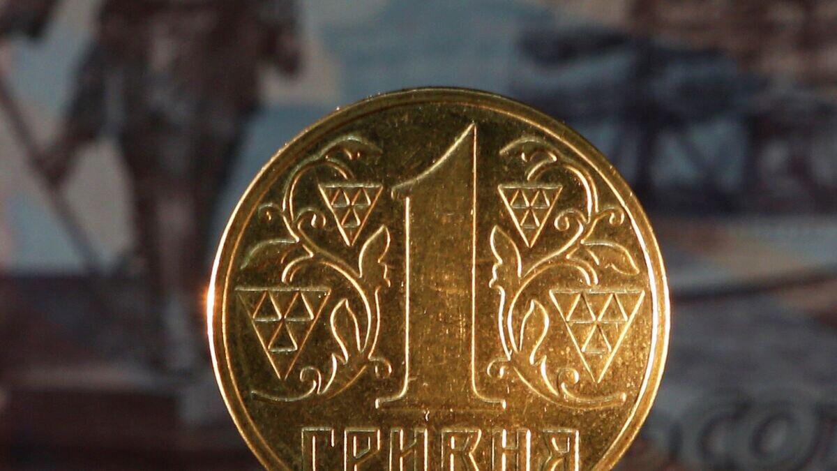    Денежные купюры и монеты России и Украины. Архивное фото© РИА Новости / Александр Демьянчук