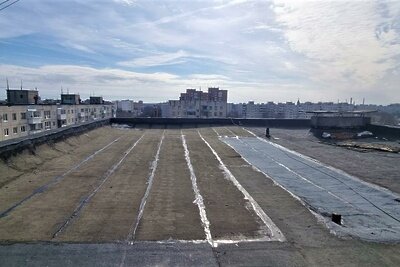    Ремонт протекающей крыши девятиэтажки © Пресс-служба Госжилинспекции Московской области