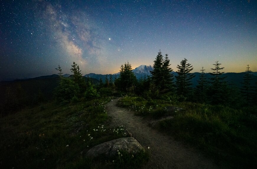 

Title:Mt Rainier

Camera:Sony E-mount Lens:14-24mm F2.8 DG DN | A
Description:

When I found out I was going to get the chance to test out the new 14-24 f2.8 that had been completely redesigned for mirrorless, I was more than just a bit excited. Although uncooperative weather on my trip to photograph Mt. Rainier would limit my time, I was determined to make the most of it. Setting up, the fast 2.8 aperture made using live view to nail my focus on the stars feel effortless. I hit the shutter for my first exposure with the aperture wide open. I waited, checked the corners, smiled, and got right to shooting. I only had time to take a few shots, but I already couldn't wait to see the images on a larger screen. Getting to see the sharpness across the entire frame put the quality of this lens on another level. The 14mm to 24mm may be a classic focal range for astrophotography, but there's undoubtedly a new champion when it comes to fast, ultra wide angle zoom lenses.  Jack Fusco
