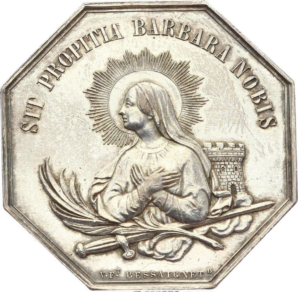 Реверс жетона угольной компании с изображением Святой Варвары Илиопольской.