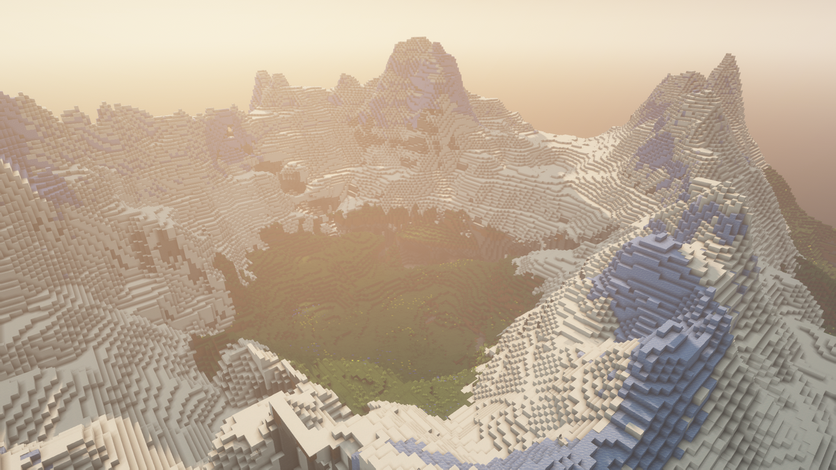 Горы с лужайкой в середине.