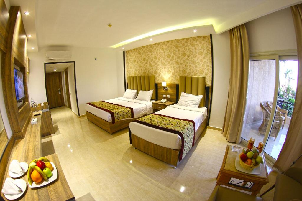 фото номера https://www.booking.com/hotel/eg/panorama-bungalows-resort.ru.html?