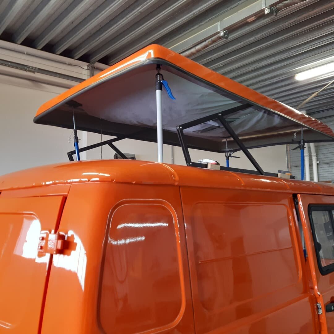 Установка подъемной крыши