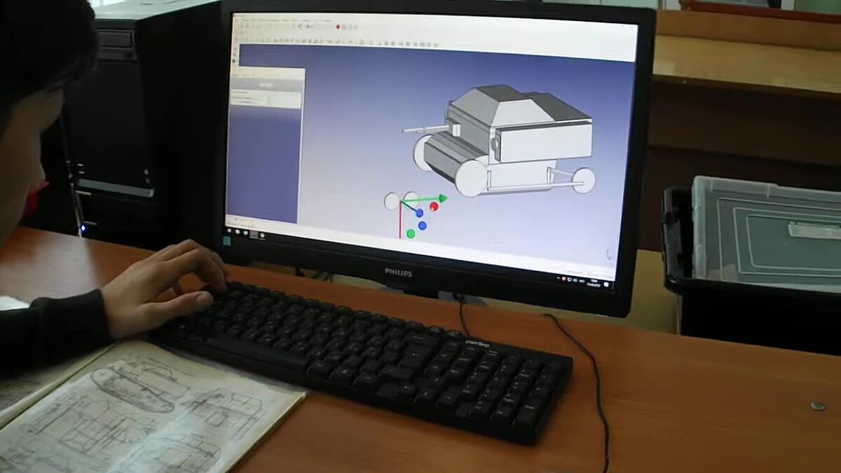 Ученик 6 класса строит 3Dмодель  в FreeCAD. Танкетка Т-27  из примитивных элементов. Просто на глаз. Набивает руку.
