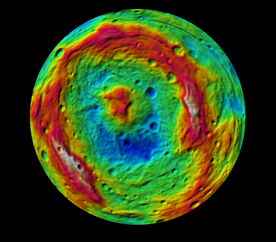 Веста. Кратер Реясильвия, возраст – 2,5 млрд лет.  Данные гравиметрии  аппарата «Dawn» (NASА), 2011 г. Поднятия – красное, низменности – зелёное, синее.  